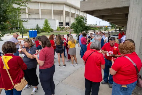 Extension Council Day on Campus participants visit while eating ice cream
