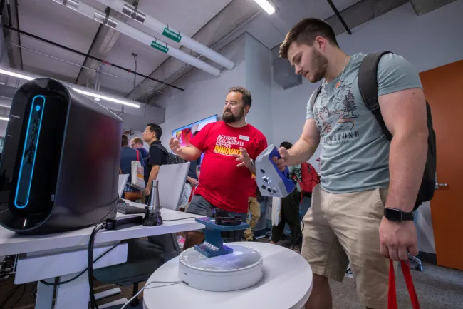Student and mentor working in the ISU Student Innovation Center