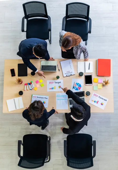 Top view group of business people meeting in board room.